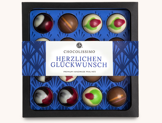 Besondere Eigenschaften der Schokoladenpralinen in verschiedenen Geschmacksrichtungen mit der Widmung &bdquo;Herzlichen Gl&uuml;ckwunsch&ldquo; aus belgischer Schokolade