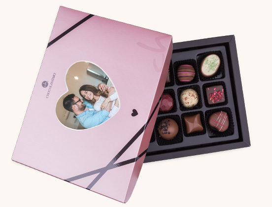 Einzigartige Eigenschaften des Pralinensets mit Ihrem eigenen Foto in Herzform