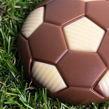 eine Schokoladenkugel in Form eines Lutschers