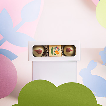 Osterpralinen K&uuml;ken und Praline mit essbarem Aufdruck f&uuml;r Unternehmen