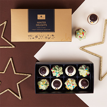 Schokoladenpralinen mit Weihnachtsmotiv verziert