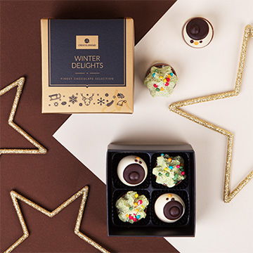 Schokoladenpralinen mit Weihnachtsmotiv verziert