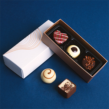 Set mit 3 Pralinen für einen Geschäftspartner in einer dekorativen Schachtel