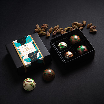 Eine Schachtel mit 4 Pralinen mit Dubai-F&uuml;llung