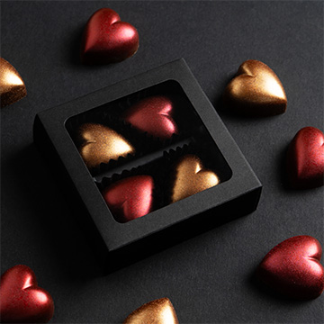 Set 4 Pralinen in Herzform mit Karamellf&uuml;llung