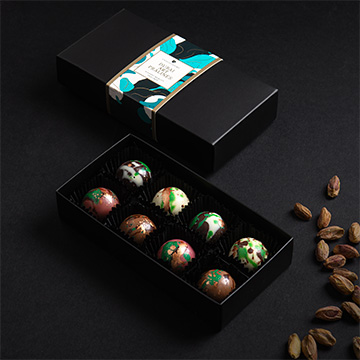 Eine Schachtel mit 4 Pralinen mit Dubai-F&uuml;llung