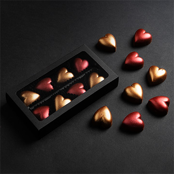 Set 8 Pralinen in Herzform mit Karamellf&uuml;llung