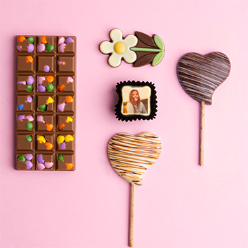 eine Schokoladentüte zum Schulanfang für ein Mädchen mit einer Praline mit einem Foto