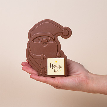 Weihnachtsmann aus Vollmilchschokolade mit eingesetzten ChocoPrint- Schokoladenwürfe