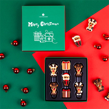 1 Weihnachtsmann, 4 Rentiere und 2 Geschenkboxen aus Schokolade