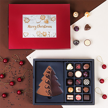 Dekorativ verpackte Weihnachts-ChocoPostcard Maxi rot
